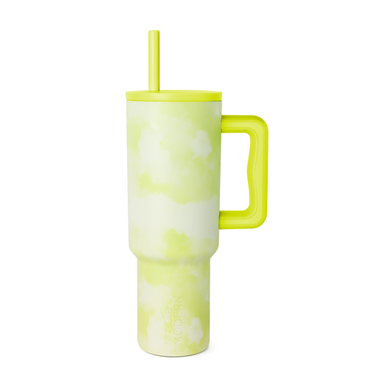 Lime green and white tie-dye pattern tumbler with neon green bold blocks and organic shapes on cream background