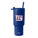Deep royal blue tumbler with white lid, featuring white and red logo graphics on the front